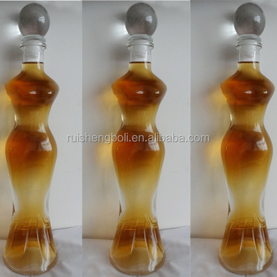 Bouteille de verre personnalisée 24 oz 26 oz en forme de corps homme et femme avec manipulation de surface décale