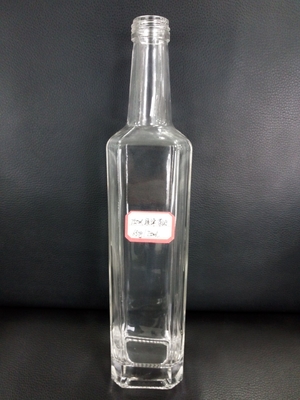 Bouteille de verre vide transparente de 750 ml de vodka et de liqueur avec type d'étanchéité liège/vis/guala