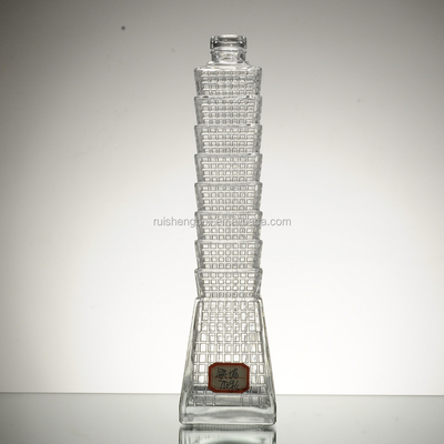 L'impression de logo en forme de tour Spirits dans une bouteille de verre transparent Élevez votre gamme de marque