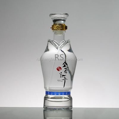 L'impression de logo en forme de tour Spirits dans une bouteille de verre transparent Élevez votre gamme de marque