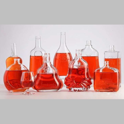 Bouteille en verre de vin transparente de forme unique avec un bouchon de 750 ml certifiée SGS