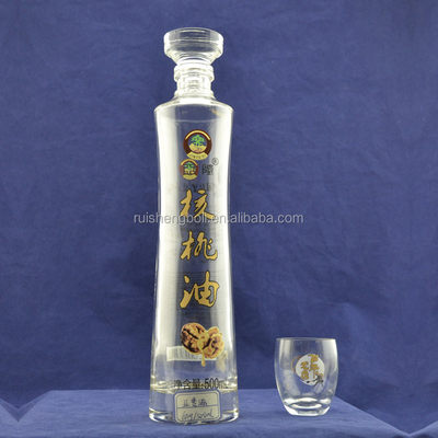 Bouteille de vodka en verre transparent fabriquée en Ukraine avec un design glacé au CIF