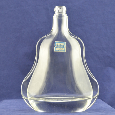Matériau de verre en flint en relief haute Tour Eiffel Bouteille en verre en forme de liqueur avec liège