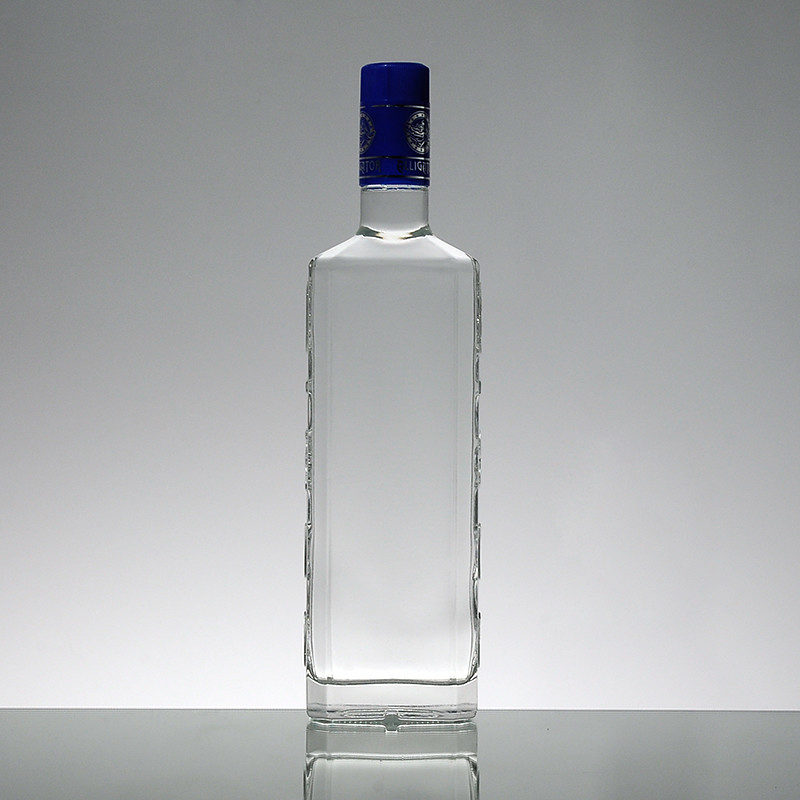Traitement de la surface d'estampage à chaud 1L bouteille de whisky en verre super Fabriqué en matériau blanc cristallin