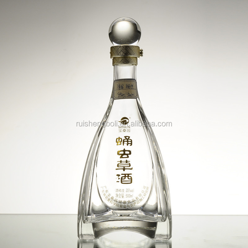 L'impression de logo en forme de tour Spirits dans une bouteille de verre transparent Élevez votre gamme de marque